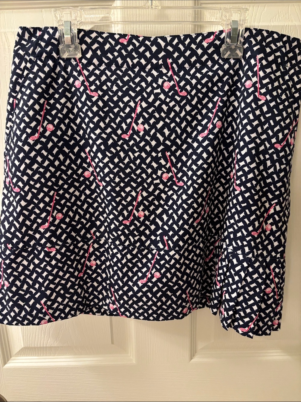 Lady Hagen Navy Skort with Pink Accent Pattern and a cute ruffle at side slit.